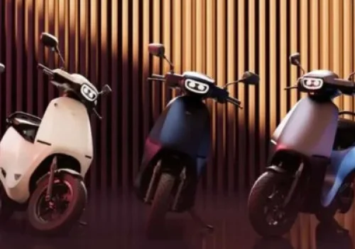 Ola Electric scooter parked in a showroom with fewer footfalls, reflecting the decline in market share in India’s EV two-wheeler segment.